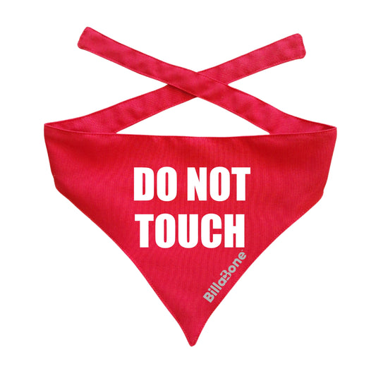 A bright red dog bandana with "DO NOT TOUCH" printed in bold white letters, designed to signal that a dog should not be approached or petted. Made by Billabone, featuring a stylish tie-on design for a secure and comfortable fit. This color means the dog might feel uncomfortable around new people or other dogs and doesn’t want to be touched.
